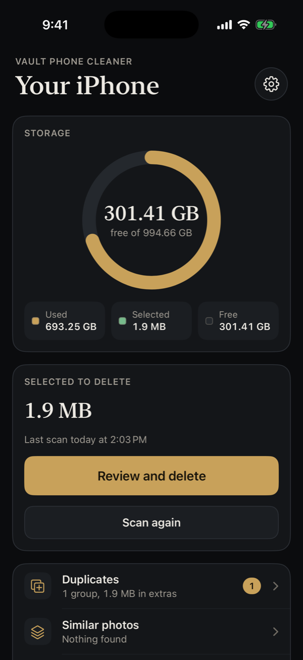 The same Your iPhone screen in dark mode, with the storage ring in brass.