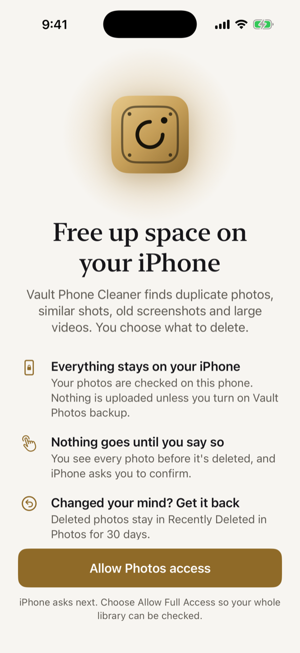 The welcome screen. Photo, video and contact tiles drift into the Vault mark, its dial turns and a gold dot pops out, then the words appear: Free up space on your iPhone, and three promises: everything stays on your iPhone, nothing goes until you say so, and deleted photos stay in Recently Deleted for 30 days.